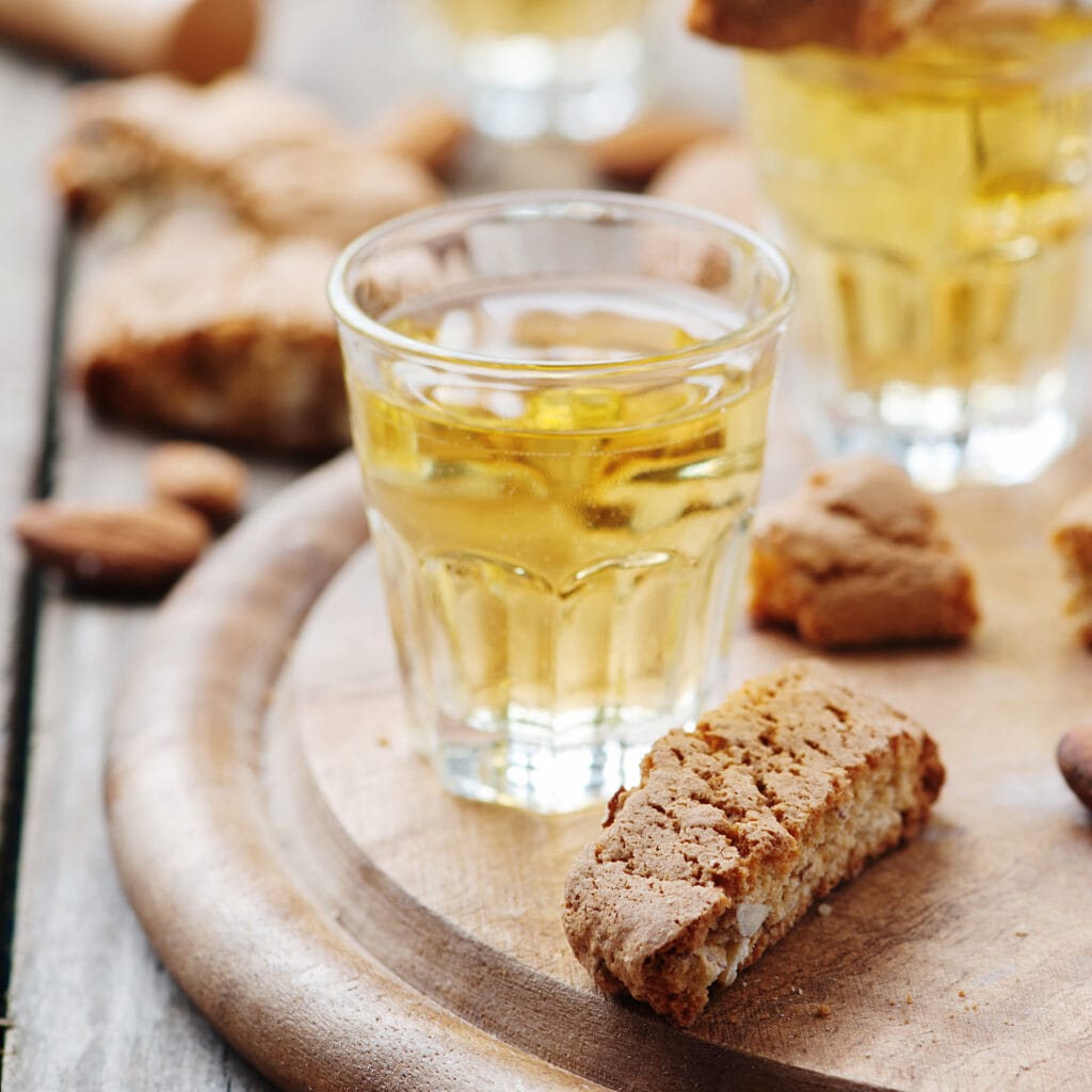 Italian cookie cantuccini and wine, selective focus and square image